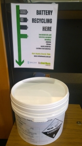 battery-recycling-sign-and-bin-lid-on